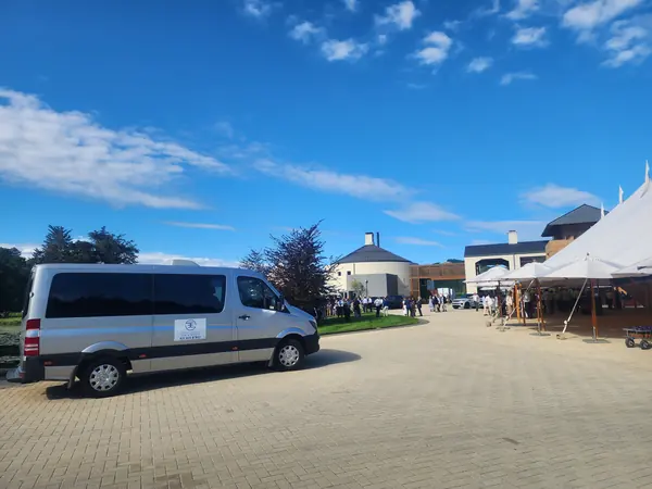 Mercedes-Benz Sprinter waiting outside Craggy Range Winery on a clear Hawke's Bay day