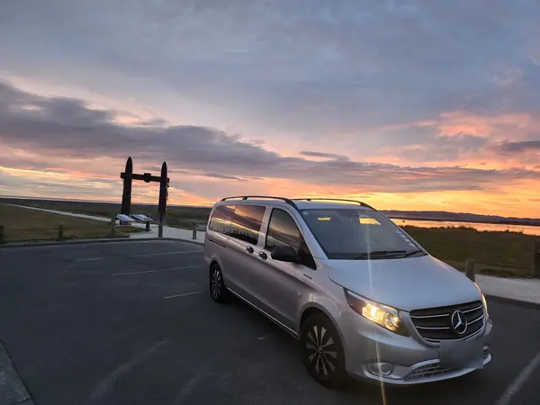 The fully electric Mercedes-Benz eVito at Ātea a Rangi, the Celestial Compass, at sunrise on the Hawke's Bay coast