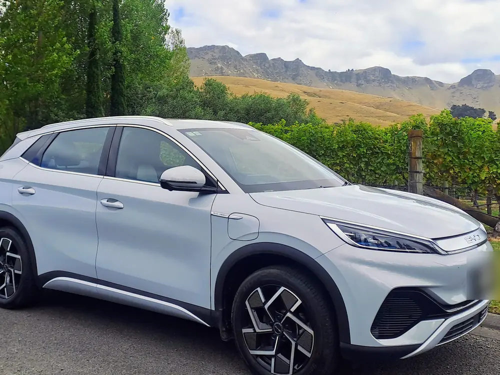 Fully electric BYD Atto 3 beside a vineyard below Te Mata Peak