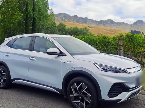 Fully electric BYD Atto 3 beside a vineyard below Te Mata Peak