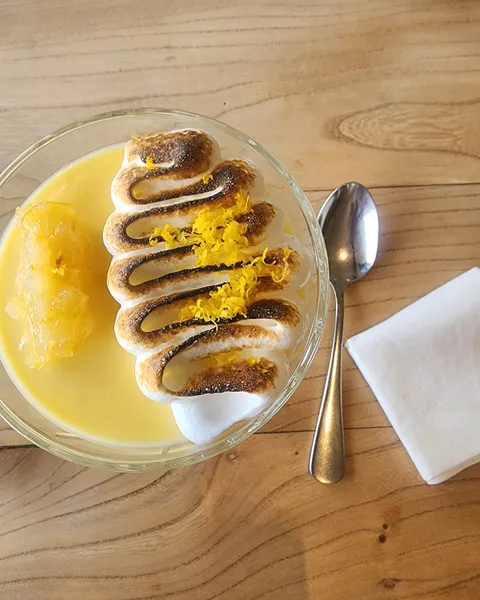 Lemon posset with burnt meringue and lemon and vanilla marmalade at Black Barn Bistro
