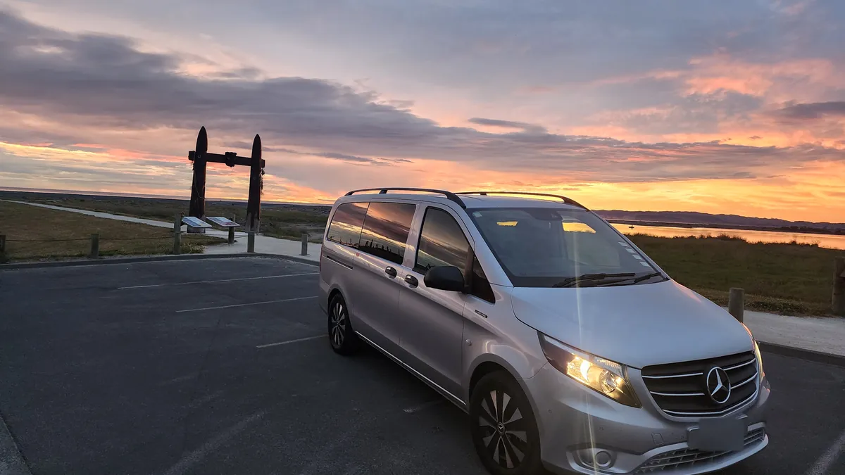 The fully electric Mercedes-Benz eVito at Ātea a Rangi, the Celestial Compass, at sunrise on the Hawke's Bay coast