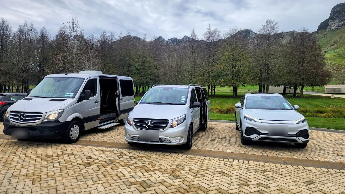 The Electric Executive Mercedes-Benz Sprinter, fully electric Mercedes-Benz eVito and fully electric BYD Atto 3 parked beneath Te Mata Peak
