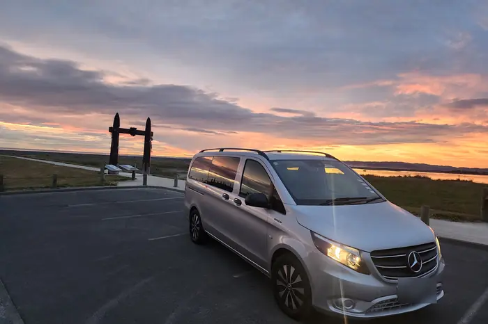 The fully electric Mercedes-Benz eVito at Ātea a Rangi, the Celestial Compass, at sunrise on the Hawke's Bay coast