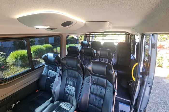 Individual leather reclining seats inside the Mercedes-Benz Sprinter, which carries up to eleven guests